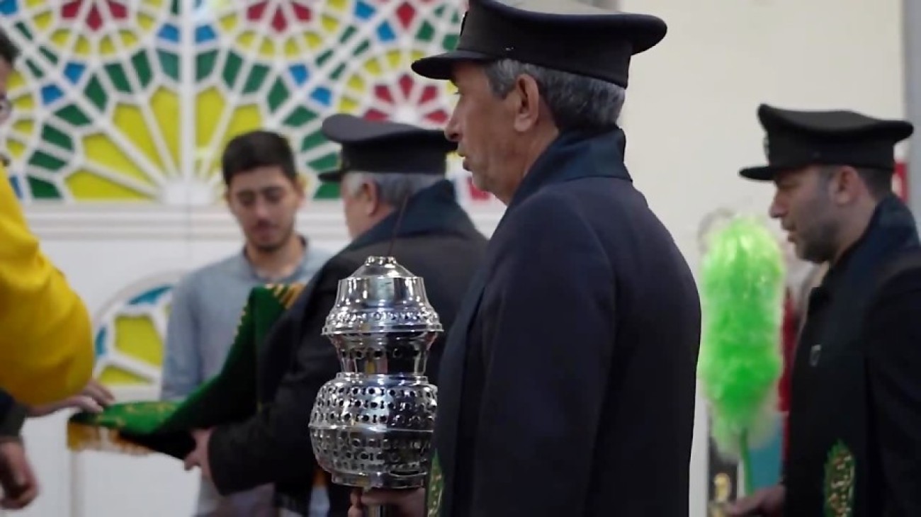 وزیدن شمیم معطر پرچم مطهر رضوی درمیان هنرمندان